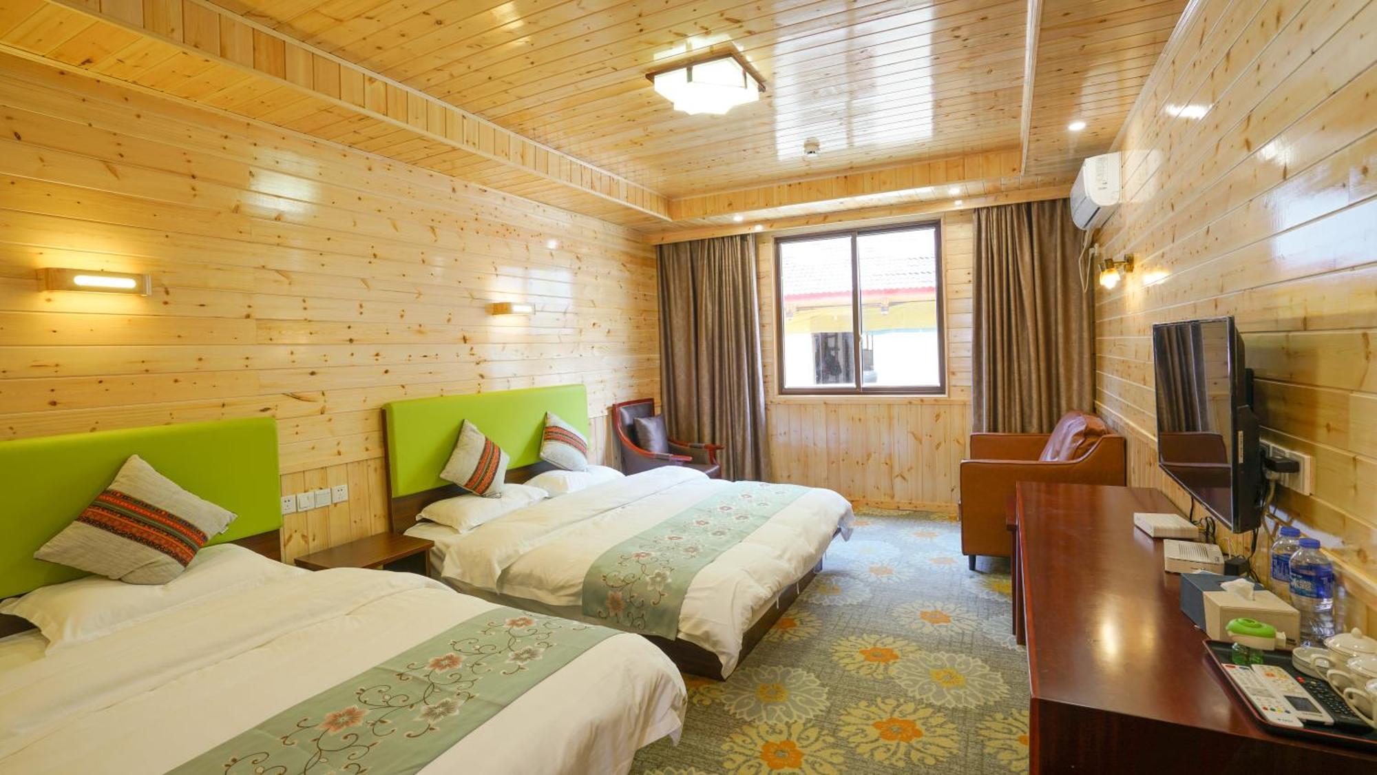Jiuzhaigou Leisure Inn Værelse billede